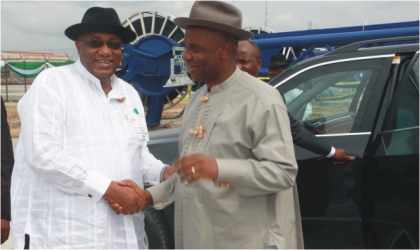 FRED31101101 Rivers State Governor, Rt Hon Chibuike Rotimi Amaechi (right) being welcomed to the Oil and Gas Free Zone ,Onne Ports by the Managing Director, Dr Noble Abe for a site visit as part of the Ist Practical Nigerian Content Conference held in Port Harcourt, last Tuesday .