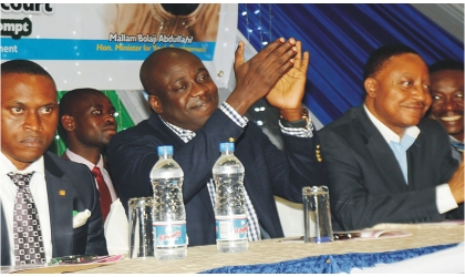 FRED02111101 Secretary to Rivers State Government, Mr George Feyii (right) with Minister of Youth Development, Mallam Bolaji Abdullah (middle) and state Commissioner for Youth Development, Mr Owene Wonodi (left), during the launching of Youth Enterprises in Port Harcourt, recently.