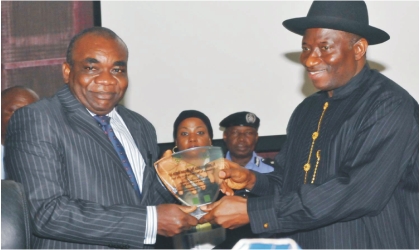 FRED23111101 President Goodluck Jonathan (right), presenting a plaque to Chief Justice of the Republic of Gambia, Justice Emmanuel Akomaye-Agim, during the 2011 All Nigeria Judges’ Conference in Abuja, Monday.