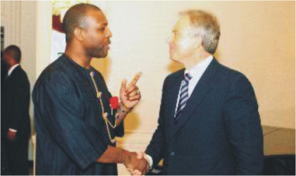 FRED30111101 Leader of Princewill Political Associates (PPA) and Consultant to Rivers State Governor on Public Private Partnership (PPP), Prince Tonye Princewill, chatting with former British Prime Minister, Mr Tony Blair, at the Business Summit in New York to woo investors to Rivers State.