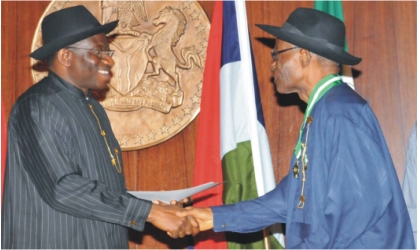 President Goodluck Jonathan (left) presenting National Merit Award to Prof Ebiegberi Alagoa  at the  Presidential Villa, Abuja, yesterday.