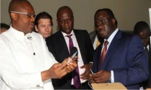 L-R:Rivers State Commissioner for Health, Dr. Sampson Parker displaying a syringe, Managing Director, Pan Africa Health Foundation, Auston Novotry,  Executive Secretary of the Foundation, Amenya Wokoma and NAFDAC Director General, Paul Orhii during a facility tour of the Rivers State Syringe and other Medical Devices Factory in Port Harcourt, yesterday.