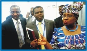 L-R: World Bank Executive Director, Dr Mansur Muhtar, Director-General, Budget Office, Dr Bright Okogu and Minister of Finance, Dr Ngozi Okonjo-Iweala, at a news briefing on the on-going spring meeting of the World Bank and the IMF in Washington DC last Friday.