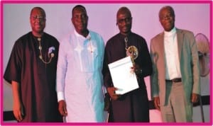 L-R: Executive Director, RSSDA, Mr Noble Pepple, Commissioner for Social Development and Rehabilitation, Hon Joe Poroma, Chairman, Okrika Local Government Council, Barrister Tamuno Williams and RSSDA Supervisory Chairman, Rev Canon Precious Omuku, at the Excellence in Local Government Initiative (ELGI) 2012 Award Night in Port Harcourt, yesterday.