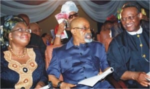 L-R: Minister of Finance, Dr Ngozi Okonjo-Iweala, Senator Chris Ngige and Chief Emeka Anyaoku, during the funeral service for literary icon, Prof. Chinua Achebe in Ogidi, Anambra State, yesterday. 