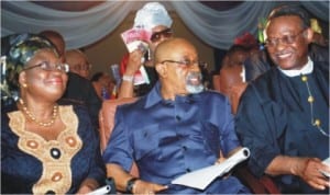 L-R: Minister of Finance, Dr Ngozi Okonjo-Iweala, Senator Chris Ngige and Chief Emeka Anyaoku, during the funeral service for literary icon, Prof. Chinua Achebe in Ogidi, Anambra State, yesterday.