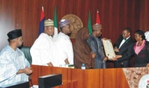 Food and Agricultural Organisation (FAO), achievement award for the Federal Republic of Nigeria, being presented to President Goodluck Jonathan by Minister of Agriculture and Natural Resources, Dr Akinwunmi Adesina (2nd right), during Federal Executive Council meeting at the Presidential Villa in Abuja last Wednesday. With them are, Vice President Namadi Sambo, Minister of State for Finance, Dr Yerima Ngama,Minister of State for Health, Dr Ali Pate, Minister of Education, Prof. Ruqayyatu Rufa'i  and Senior Special Assistant to the President on MDGs, Dr Precious Gbeneol.