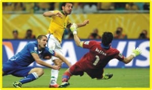 Brazil Fred (middle) scoring his side’s fourth goal against Italy at the weekend in the last group A match of the Confederation Cup.