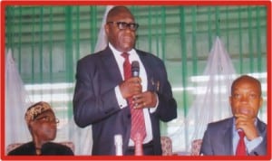 Chairman, Rivers State Civil Service Commission, Sir Ngo Martyns-Yellow (middle) speaking during the 2013 Civil Service Week/Awards day in Port Harcourt, yesterday. With him are the state Attorney-General and Commissioner for Justice, Barrister Nworgu Boms (right) and former Mayor of Port Harcourt, Chief G.W Iroanwusi. Photo: Prince Dele Obinna