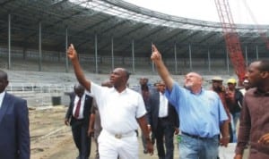 Rivers State Governor, Rt. Hon. Chibuike Rotimi Amaechi (left), inspecting the new utra-modern Sports complex that is almost completed by his administration at the new Greater Port Harcourt city. With him is the project supervisor
