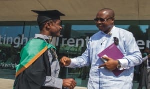 The Executive Director, Rivers State Sustainable Development Agency, Noble Pepple (right), congratulating one of the beneficiaries of RSSDA scholarship during his graduation in a university i n the UK recently.