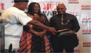   Former National President of NUJ, Mr. Ndagene Akwu(left),  Andy Briggs Most outstanding Government Spokesman Award to Hon. Ibim Semenitari, Commissioner for Information and Communications (middle) during a ceremony tat Le Meridian Hotel, in Port Harcourt, recently.