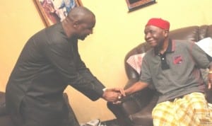 Senator Magnus Abe in a handshake with Gbenemene Ken-Khana, King M.S.H. Eguru, during a visit to his palace,  before the Senator presented free wrappers to women of Rivers South-East Senatorial District, recently.