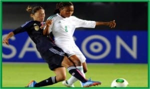 A Super Falcons player and her Japanese counterpart in an international friendly match won by the host Japan 2-0, Monday