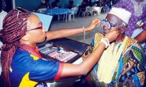 An old man testing his sight at Adeoyo hospital during World Sight Day celebration in Ibadan, recently   Photo: NAN