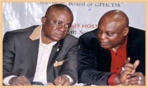 Member, House of Representatives and former Commissioner for Information and Communications, Rivers State, Hon Ogbonna Nwuke (right) with Commissioner for Special Duties, Barrister Dickson Umunakwe, during the public presentation of the book, Eminent Persons in Rivers State by the Rivers State Newspaper Corporation, publishers of the The Tide newspapers, yesterday