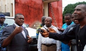 PDP Chairmanship candidate for Ezeagu Local Government Area of Enugu State, Mr Emeka Ozoagu (left), addressing newsmen after screening by Enugu State Independent Electoral Commission in Enugu recently.
