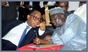 Minister of Industry, Trade and Investment,  Dr Olusegun Aganga  (left),  with  Minister of Transport,  Senator Idris Umar,  at the 2013 Nigeria Oil and Gas Trade and Investment Forum in Port Harcourt, last Thursday