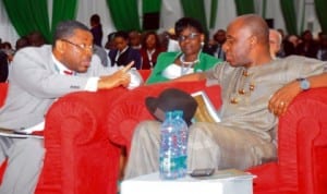 L-R:  Representative of Minister of Petroleum Resources,  Mr Abiye Membre (left)  and  Governor Chibuike Amaechi of Rivers State,  at the 2013 Nigeria Oil and Gas Trade and Investment Forum in Port Harcourt last Thursday.