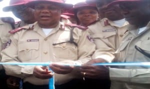 FRSC Zonal Commander in Benin, Mr Charles Akpabjo launching the 2013 “Ember Month” campaign in Asaba last Friday.