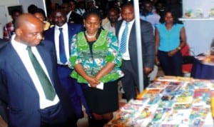  Governor  Chibuike Amaechi of  Rivers State (left), with Director, Port Harcourt Book Festival, Mrs Koko Kalango (middle), during the Port Harcourt Book Festival in Port Harcourt, recently.                  Photo: NAN