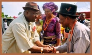 Rivers State Deputy Governor, Engr Tele Ikuru (left) in a handshake with former Deputy Governor of the State, Dr. Dominic Anucha, during the traditional marriage of the latter’s daughter, in Amaji, Omuma LGA, last Saturday . With them is former Rivers State Head of Service and wife of Dr Anucha, Mrs Esther Anucha (middle).