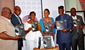 L-R: Acting Chairman, National Population Commission, Dr Sam Ahaiwe, Resident Coordinator, UN System in Nigeria, Mr Daouda Toure, UNFPA Country Representative, Ms Victoria Akyeampong, wife of Cross River Governor, Mrs Obioma Imoke, Governor Liyel Imoke and Deputy Governor, Mr Efiok Cobham, at thepresentation of a book on 'Motherhood in Childhood', to mark the International Day of the Girl Child in Calabar, yesterday .