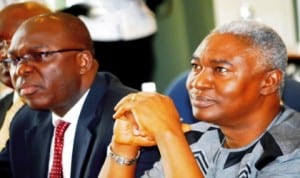Executive Director, Federal Mortgage Bank of Nigeria, Mr Newton Ordia (left), with Chairman, Forum of Advocates for Social Housing, Mr Ezekiel Nya-Etok, at the 4th Annual National Social Housing Seminar in Abuja last Friday.