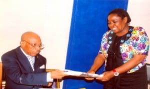 Director, Administration, Rivers State Newspaper Corporation, Mrs Emi Jameson, representing General Manager, Mr Celestine Ogolo, presenting some copies of The Tide Newspaper to the Chairman, Association of Justices of the Peace, Rivers State, Deacon G. S. Bereiweriso, during the association’s  courtesy visit to the corporation last Monday.  Photo: Egberi Sampson