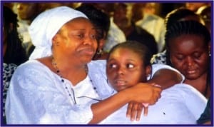 Wife of late former Speaker of Rivers State House of Assembly, Barr Mrs Sotonye Tonye Harry, with her daughter, at the Service of Songs in Port Harcourt, last Wednesday. Photo: Chris Monyanaga