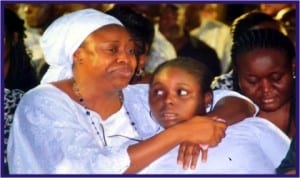 Wife of late former Speaker of Rivers State House of Assembly, Barr Mrs Sotonye Tonye Harry, with her daughter, at the Service of Songs in Port Harcourt, last Wednesday. Photo: Chris Monyanaga