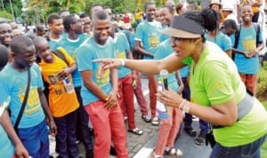 Wife of Cross River Governor, Mrs Obioma Imoke, speaking to youths during the commemoration of the International Day of the Girl Child in Calabar, recently. Photo: NAN