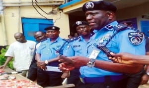 Commissioner of Police, Edo, Mr Foluso Adenajo (right), briefing newsmen on the arrest of 29 suspected criminals in Benin, recently. Photo: NAN