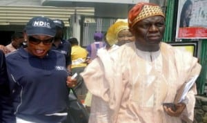 Representative of the Managing Director, Nigeria Deposit Insurance Corporation (ndic), Mrs Lola Abiola-Edewor (left), and the Vice-President, Lagos Chamber of Commerce and Industry, Mr Babatunde Ruwase, during ndic day at the ongoing Lagos International Trade Fair in Lagos, recently. Photo: NAN