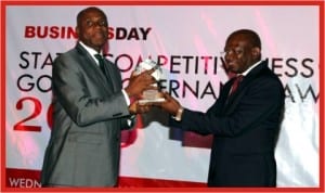 Rivers State Governor, Rt. Hon. Chibuike Rotimi Amaechi (left), receiving the BusinessDay Newspaper Best Governor in Education Development Award from the Publisher of BusinessDay Newspaper, Mr Frank Aigbogun, at Federal Palace Hotel, Victoria Island, Lagos, Wednesday.