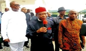 Governor Theodore Orji of Abia State (middle), addressing newsmen on why the State recalled sacked Non-Indigenes in Umuahia last Thursday . With him are:   Chief Of Staff, Mr Comas Ndukwe (left) and Commissioner for Information and Strategy, Mr Eze Chikamnayo. Photo: NAN