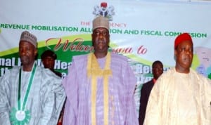 L-R: Representative of Gombe State Governor, Mr Abdulhameed Ibrahim, Deputy Governor of Bauchi State, Alhaji Sagir Saleh and Chairman, Revenue Mobilisation Allocation and Fiscal Commission, Mr Elias Mbam, at the North-East Zonal public hearing on Review of Revenue Allocation Formula in Bauchi recently. Photo NAN