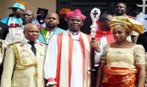 L-R: Assistant Corp Marshal in-charge of Zone 5, Mr Nseobong Akpabio, Anglican Bishop of the Diocese of the Niger, Bishop Owen Nwokolo and his wife, Nonye, during the church service for the 2013 Africa Road Safety Day and for remembrance of road crash victims in Awka last Sunday. Photo: NAN