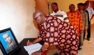 Chairman, Academic Staff Union of Universities (Asuu), Enugu State University of Scienece and Technology (Esut), Prof. Gab Agu and other Asuu members, signing the condolence register in honour of the late former Asuu President, Prof. Festus Iyayi, at Esut permanent site, Agbani in Enugu last Wednesday. Photo: NAN