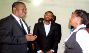 Special Adviser to the Rivers State Governor on ICT, Engr Goodliffe Nmekini (left) chatting with Executive Director, Keeping it Real Foundation, Mrs  Bitebo Gogo, during the donation of computers to the foundation in Abuloma, Port Harcourt, yesterday.  With them is the Operation Manager of the foundation, Mr Brendan Dumpe Photo: Egberi A. Sampson