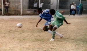 Dolphins and Enyimba players struggling for the ball  during a league match in Port Harcourt, recently