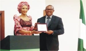 L-R: Mrs Bianca Odumegwu-Ojukwu, with Governor Peter Obi of Anambra State, at the Nigeria-Spain Investment Forum in Madrid, yesterday.