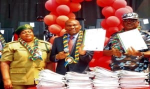 L-R: Assistant Controller-General of Prisons, Dr Ekpedeme Udom, Chairman, House Committee on Health, Rep. Ndudi Elumelu and representative of I-G, Mr Dauda Fakai, at the official launch of the Police Action Committee on Aids Strategic Plan Document in Abuja, last Tuesday. 