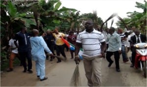 Youths of Gokana Local Government Area of Rivers State during a street procession displaying APC flag and brooms symbolizing their acceptance of the party in the area, recently.