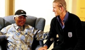 Former England captain David Beckham (right) with Mandela in 2003