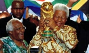Mandela with the World Cup trophy just before the 2010 FIFA World Cup