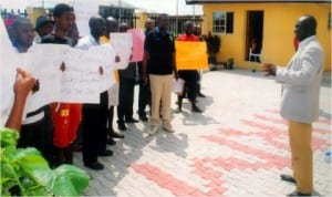 Palace Representative, Dr Igani Isefiema, addressing youths of Dumo-Ama in Okrika Local Government Area of Rivers State over their protest against operations of MS Roudo Ltd at the Palace of HRH Chief E. T. I Obudibo, in Okrika, yesterday. Photo: Obinna Prince Dele