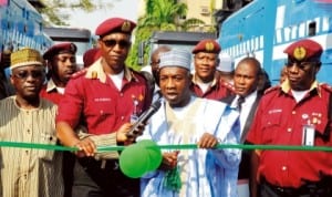 L-R: Unit Manager, Ministry of Works, Mr Mohammed Isa, frsc  Corps Marshal, Mr Osita Chidoka, representative of the Minister of Works, Mr Abubakar Mohammed, and the  Deputy Corps Marshal, Mr Boboye Oyeyemi, at the handover of heavy duty trucks and patrol vehicles by the Minister of Works to frsc, in Abuja, recently. Photo: NAN