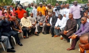 Members of Rivers State House of Assembly holding their meeting on Moscow Road as security operatives stopped them from gaining entrance into the Assembly complex in Port Harcourt last Thursday