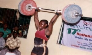 Female weightlifter in action during a national event in Port Harcourt, Rivers State, recently.